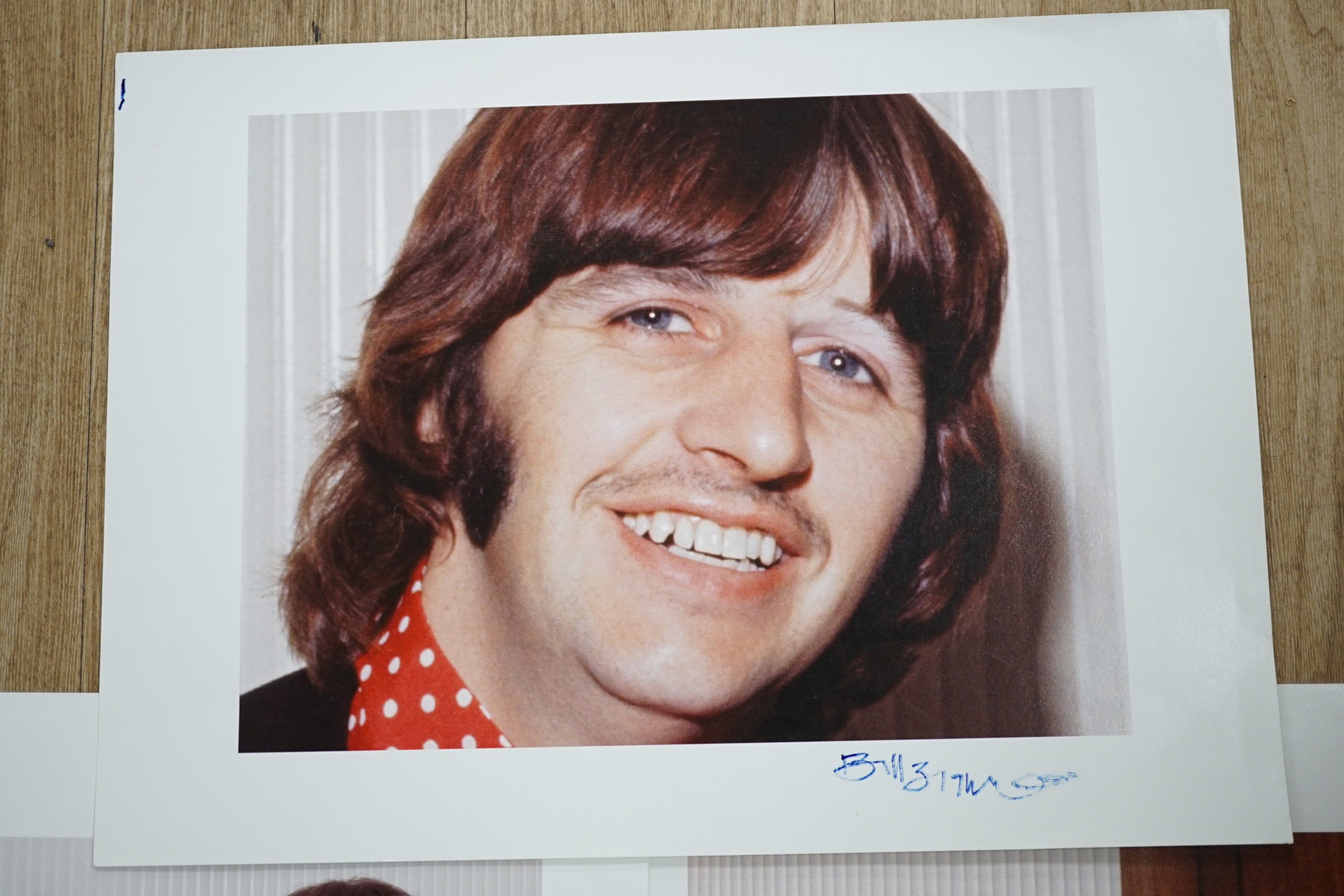 Three photographs of the Beatles by Bill Zygmant; Ringo Starr, George Harrison and a group comprising Paul, John and Ringo, all signed by Zygmant and two dated 1968, all 54 x 40cm